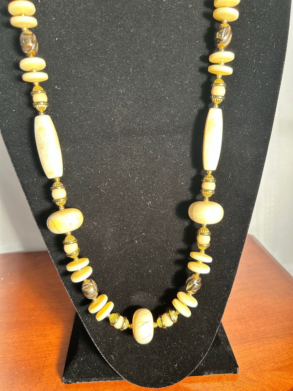 Vintage Napier Faux Ivory Swirl Bead Necklace Gold Tone Accent Chunky 36 In